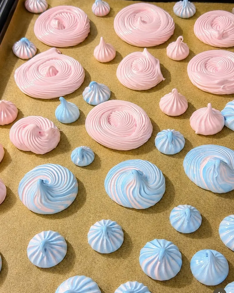 A tray of Kayo's Flavors treats individually packaged with handwritten ingredient labels.